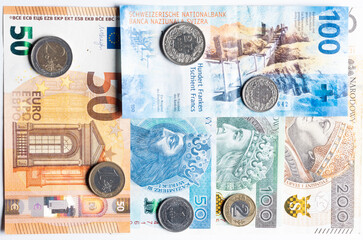 polish zloty, swiss francs and euro currency coins and banknotes