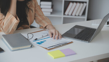 Business Documents, Auditor businesswoman checking searching document legal prepare paperwork or report for analysis TAX time,accountant Documents data contract partner deal in workplace office