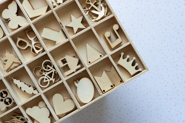 box of wooden embellishments