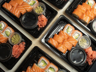 Philadelphia rolls with salmon and vegetables in a box