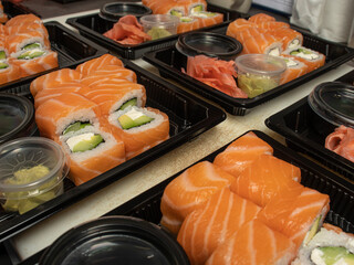 Philadelphia rolls with salmon and vegetables in a box