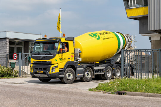 ZWOLLE, NETHERLANDS - MAY 8, 2023: Mebin Volvo FMX concrete mixer. Mebin is a subsidiary of the HeidelbergCement Group, one of the largest producers of cement and ready-mixed concrete.