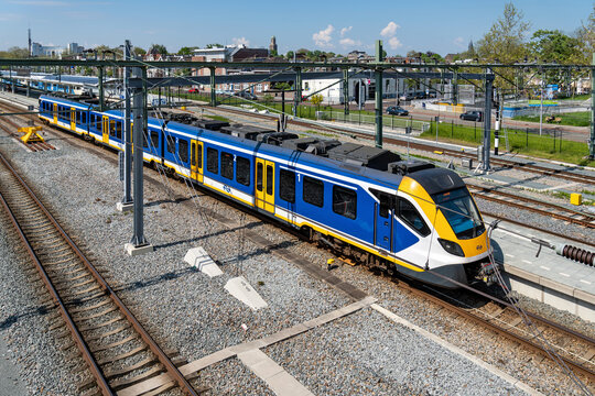 ZWOLLE, NETHERLANDS - MAY 12, 2023: Nederlandse Spoorwegen CAF SNG train at Zwolle station