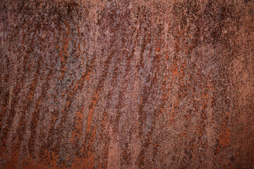 Beautiful abstract texture background from an iron sheet covered with corrosion and rust.