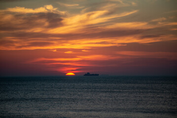 Naklejka na ściany i meble morning sunrise over atlantic ocean in virginia beach virginia