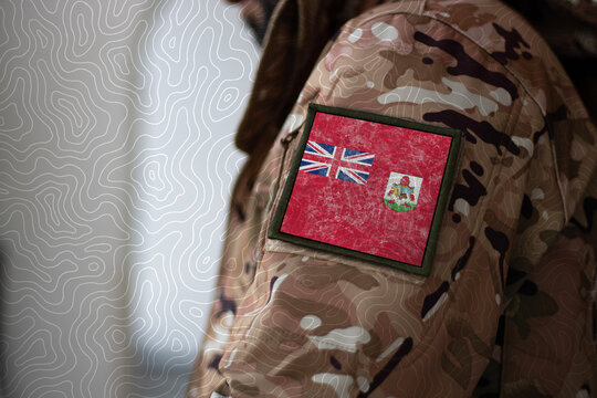Bermuda Soldier. Soldier with flag Bermuda, Bermuda flag on a military uniform. Camouflage clothing