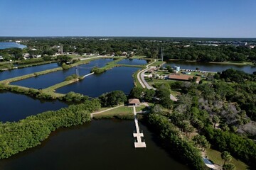 Fototapeta premium A drone photo of fishing pier in Tampa Bay, Florida. An aerial view of the natural beauty of a city park.