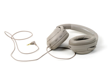Gray headphones on white surface