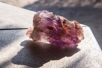 Pink amethyst, in its natural, non-polished state, reveals soft pink hues with translucent clarity....