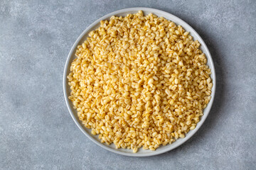 Dishes from traditional Turkish cuisine; head bulgur pilaf - whole bulgur wheat. Turkish name; Soganli bulgur pilavi or basbasi bugday pilavi