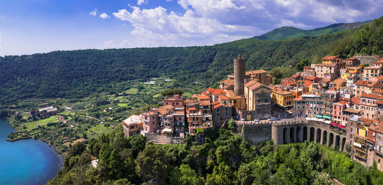 Most scenic lakes of Italy - volcanic Lago di Nemi , aerial drone view of Nemi village and volcano crater. popular touristic site near Rome
