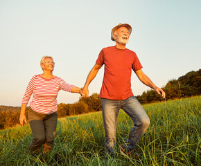 woman man outdoor senior couple happy lifestyle retirement together smiling love old nature mature elderly vitality active