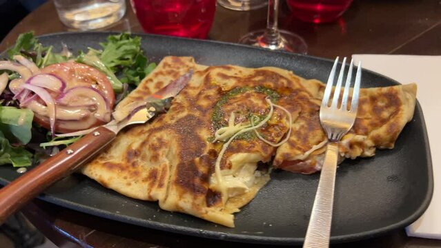 traditional cheese omelett in restaurant in Paris, France
