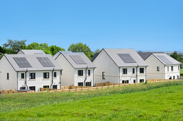 Solar panels installed on home roofs at new housing development