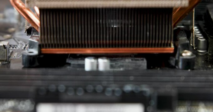 Adding clean fan on new thermal paste on processor 