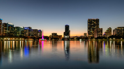 Fototapeta na wymiar Orlando city skyline at night. Panoramic view of Orlando in Lake Eola Park, Florida, USA 