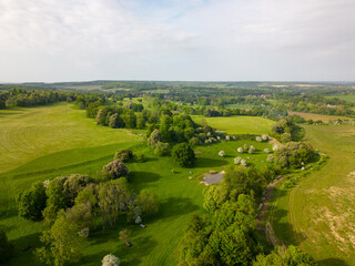 Aerial drone photo of the meadows and countryside of Kent Downs, south England.
