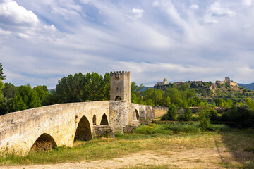 stone bridge over Ebro river in Frias, Burgos province, Castilla Leon, Spain