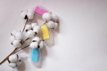 Beautiful white cotton flower capsules with cleaning air Freshener and toilet detergent on a white background