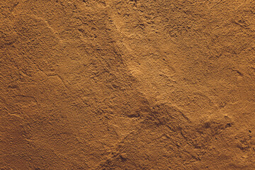 dark yellow grunge cement wall, textured background.