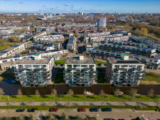 Obraz premium Aerial drone photo of several apartment buildings in the city of Leiden in Zuid-Holland, the Netherlands. 