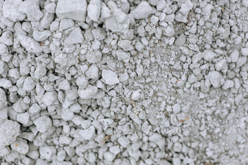 Background, texture of crushed stone, small building stones close-up in nature.