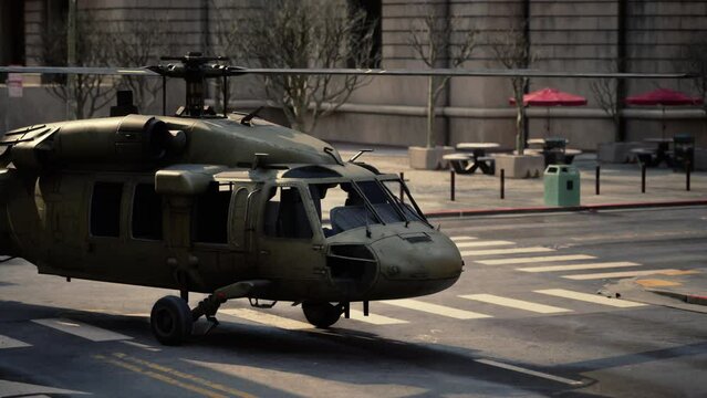 military helicopter in downtown at sunset