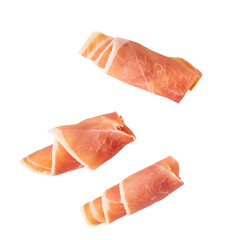 Jamon, Prosciutto, Speck, Dry Cured Meat or Ham slice, rolled up isolated on white background.