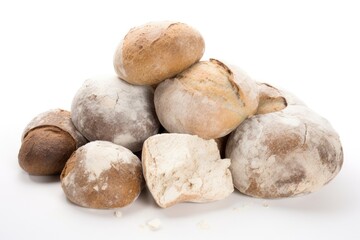 Fototapeta premium variety of bread types stacked on a plain white background Generative AI
