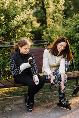 A girl, an athlete with a cast, a bandage after a fracture with ice cream in her hands, and her...