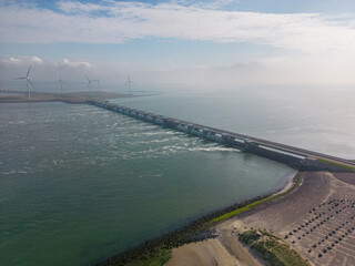 This aerial drone photo shows the Eastern Scheldt storm surge barrier in Zeeland, the Netherlands. This is also called the Oosterscheldekering near Neeltje-Jans and protects the land for high tide. 