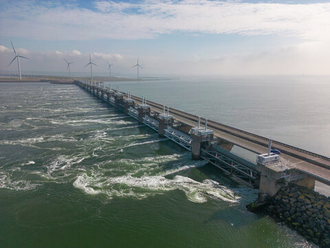 This aerial drone photo shows the Eastern Scheldt storm surge barrier in Zeeland, the Netherlands. This is also called the Oosterscheldekering near Neeltje-Jans and protects the land for high tide. 