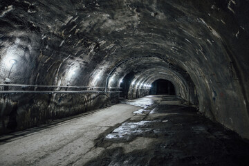 Dark large tunnel at old underground bunker - obrazy, fototapety, plakaty