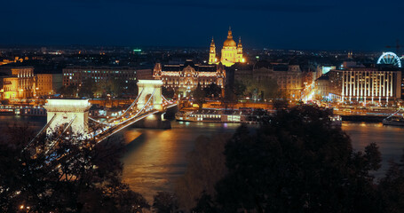 Fototapeta na wymiar Chain Bridge and Parliament in night light of Budapest outdoors.