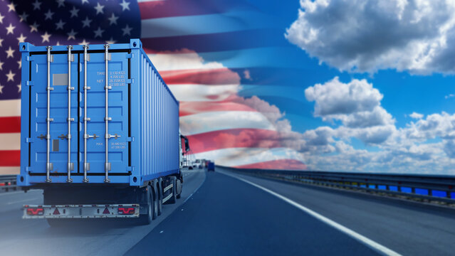 Truck with USA flag. Road transport. Blue container on truck. Import of goods from USA. Thunder business in America. Highway with truck carrying goods. Sea container transportation. Logistics in USA