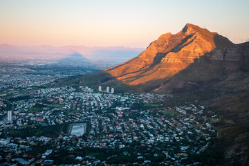 A sunset shadow of Lion's Head at the foot of Table Mountain above Cape Town, South Africa