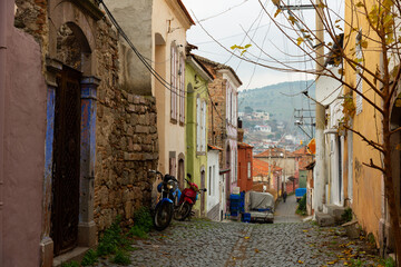 Fototapeta na wymiar Picturesque narrow street in the old town of Pergamon. Turkey
