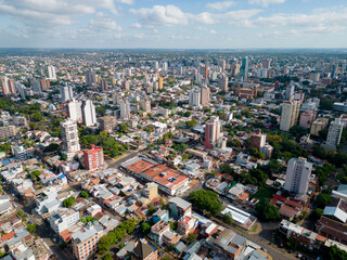 Aerial view of the city Posadas in the interior of Argentina. Buildings, vegetation and urban life.