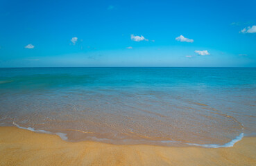 Fototapeta na wymiar Nature view of beautiful tropical beach and sea in sunny day. Beach sea space aera