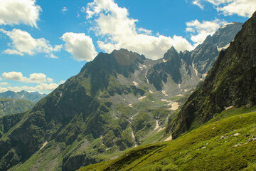 Fototapeta na wymiar Panoramic view of the Caucasus mountains. Near the village of Arkhyz. Karachay - Cherkessia, Russia