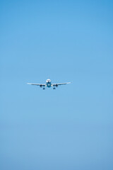 Airplane flying at sky, Airliner passing blue sky.