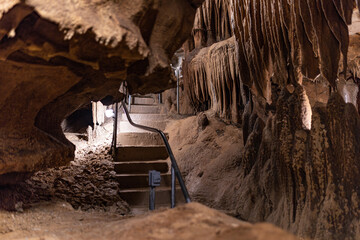 One of the chambers of Cristal Onyx cave in Western Kentucky with staircases and lighting.