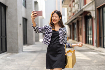 Portrait of smiling beauty asian woman posing look at camera making live selfie, content, vlogger, blogger, live video streaming, broadcast, podcast, online influencer and creator on smartphone 