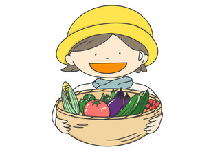 夏野菜を収穫した女性