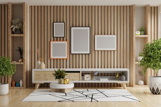 Mockup poster frame in modern interior background with cabinet and accessories in the room.3d rendering