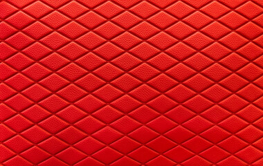 red leather background and texture as a pattern for the interior car or a sofa or wall covering