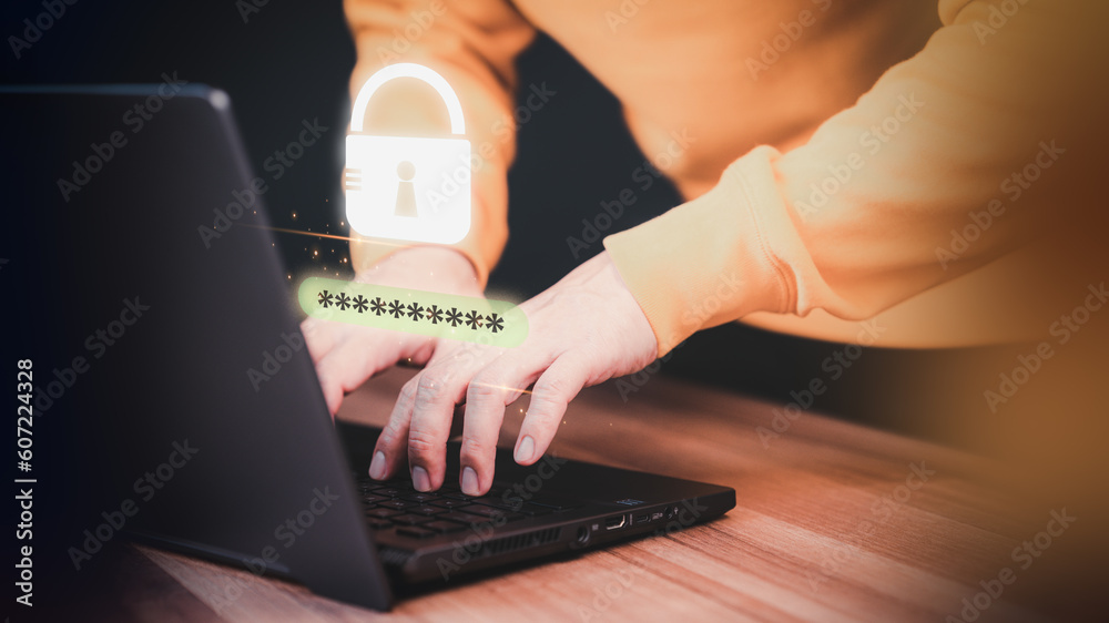 Leinwandbilder Adult man typing his user and password on a computer laptop. Cyber security concept to protect personal data. Secure encryption and access to the user's private information to access the internet.