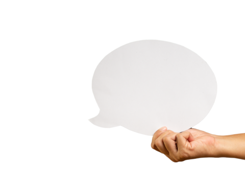 Close-up of hand holding a blank white speech bubble while standing against a transparent background