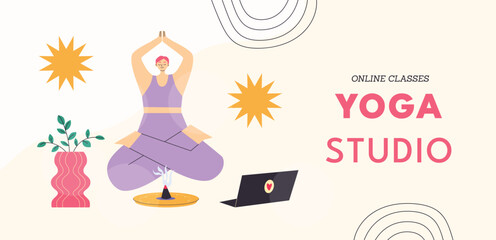 Yong woman watching online yoga classes on laptop, practicing yoga at home.