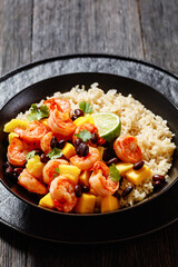 shrimps with beans, mango, brown rice in bowl